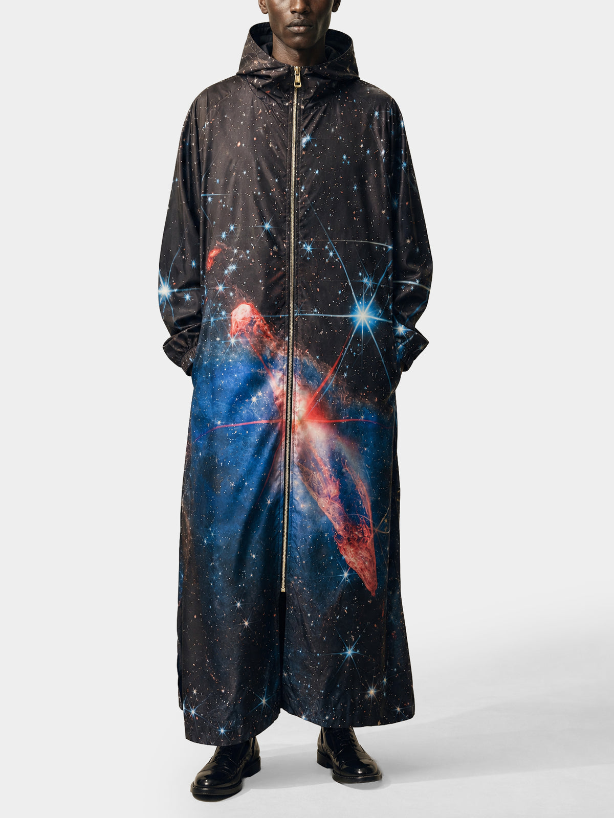 Cosmos Long Parka by Irina Voinea, long hooded waterproof parka with deep space print, studio image 1